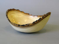 Wood turned ash bowl with natural edge